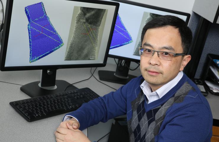 <p>Ting Zhu, an associate professor in Georgia Tech’s Woodruff School of Mechanical Engineering, worked with colleagues at the University of Pittsburgh and Drexel University to develop a better understanding of a key deformation mechanism in nanoscale tungsten. (Credit: Candler Hobbs)</p>