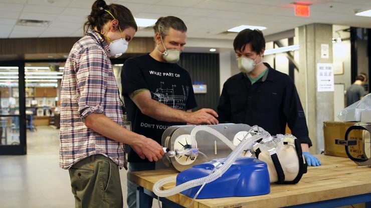 <p>Researchers evaluate operation of a simple, low-cost ventilator based on the resuscitation bags carried in ambulances. (Credit: Steven Norris, Georgia Tech)</p>