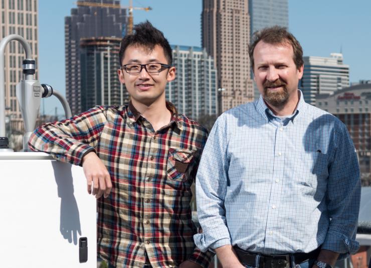 <p>Hongyu Guo, Georgia Tech grad student and Rodney Weber, a professor in Georgia Tech’s School of Earth &amp; Atmospheric Sciences</p>