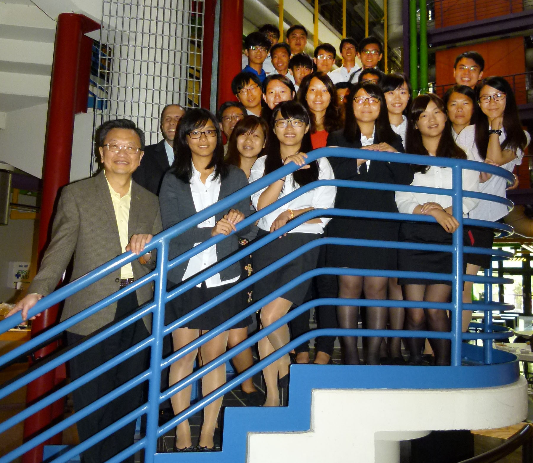 Ben Wang, executive director of GTMI, with 25 students from China Medical University