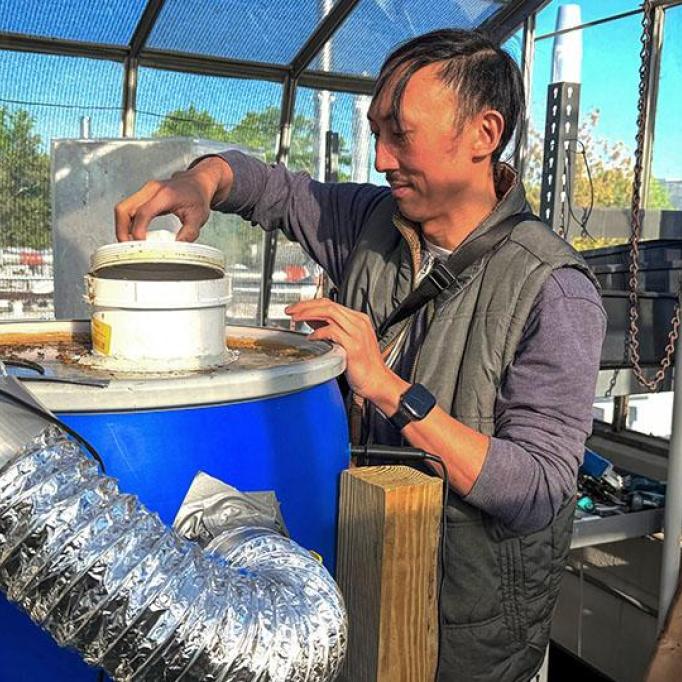 David Hu and his students run an experimental composting unit within a greenhouse on top of a building on Georgia Tech's campus. 