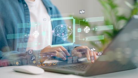 Person working on a laptop with a digital visualization of an AI system, code, and automated workflows.