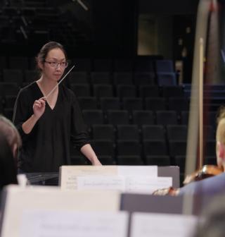Chaowen directing orchestra