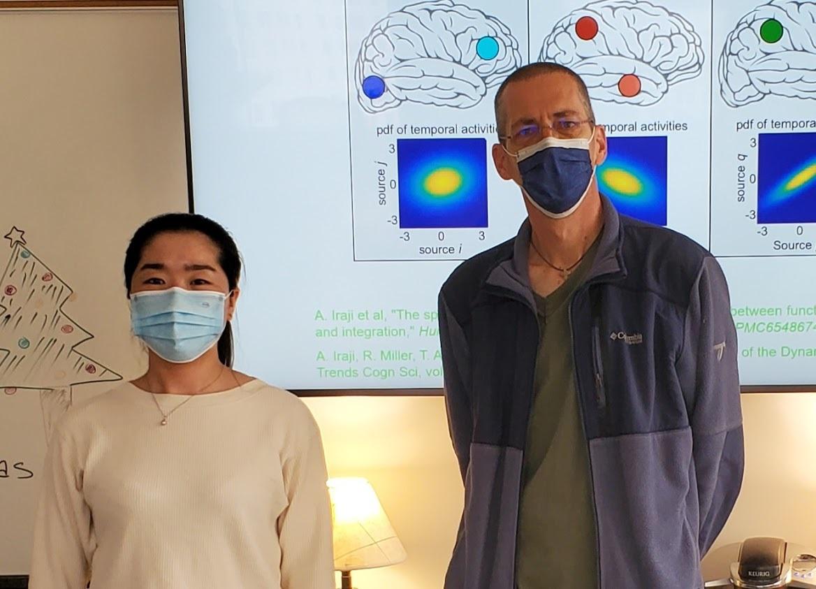 Researchers Kuaikuai Duan and Vince Calhoun have found that neurological complications of Covid-19 patients may be linked to lower gray matter volume in the front region of the brain even six months after hospital discharge. (Photo credit: Calhoun)
