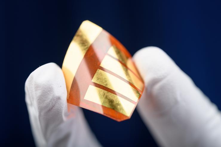 <p>Perovskite-based solar cells are flexible, lightweight, can be produced cheaply and could someday bring down the cost of solar energy. (Credit: Rob Felt)</p>