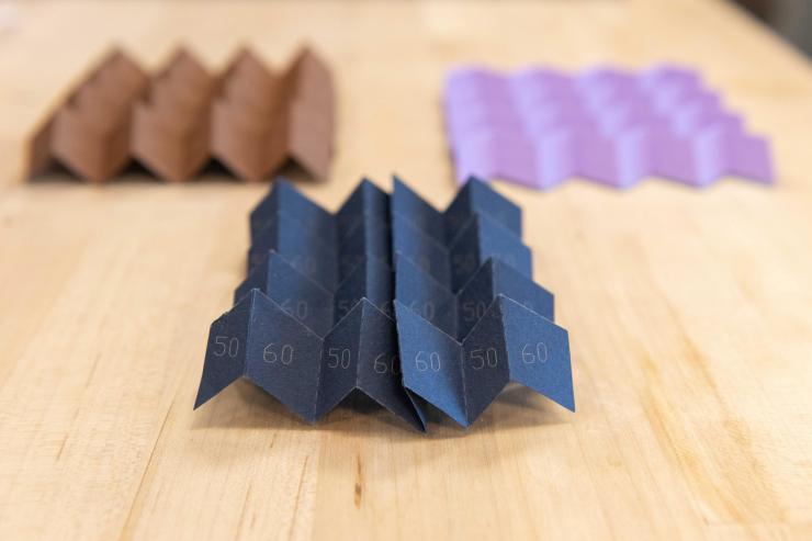 <p>A new type of origami can morph from one pattern into a different one, or even a hybrid of two patterns, instantly altering many of its structural characteristics. (Credit: Allison Carter)</p>