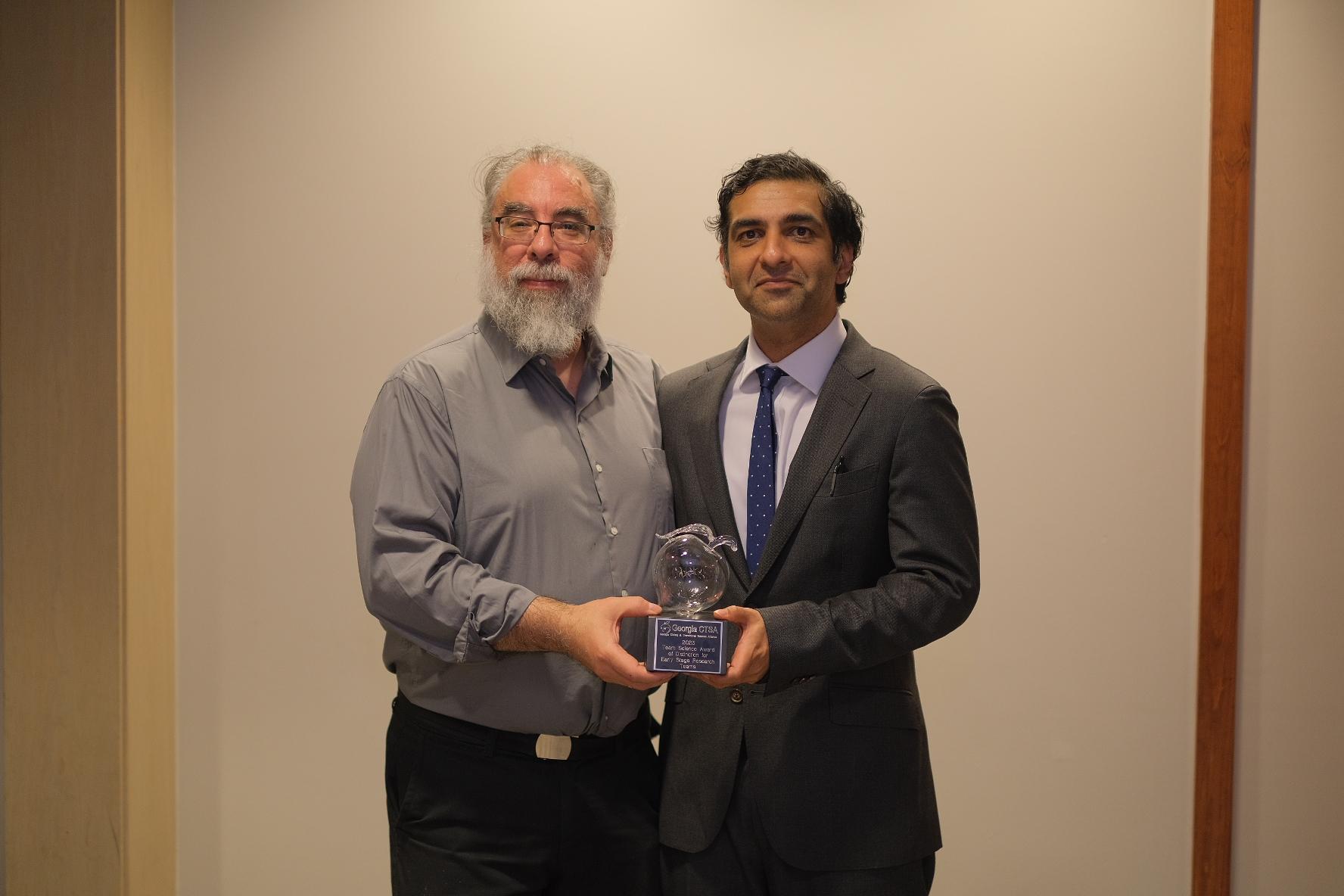Flavio Fenton and Neal Kumar Bhatia receive award