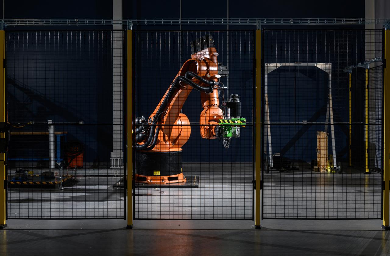A peek inside the AMPF facility - industrial robotic arm shown