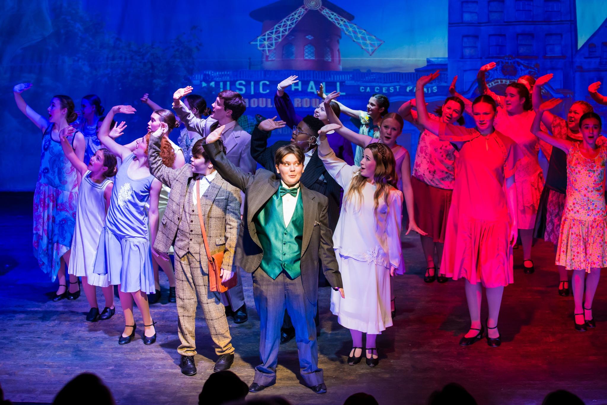 Theater group on stage.