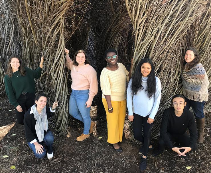 <p>Group photo of the first class of BBISS GRA Scholars in front of the EcoCommons Patrick Dougherty Sculpture installation. They are Katherine Duchesneau, Ioanna Maria Spyrou, Meaghan McSorley, Bettina Arkhurst, Udita Ringania, Yilun 'Elon' Zha, and Marjorie Hall.</p>