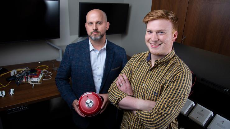 <p>Chris Roberts (left) is a GTRI principal research engineer and lead instructor for the Embedded Systems Cybersecurity (ESCS) VIP class. Allen Stewart (right) is a GTRI research engineer and one of the co-instructors for the course (Credit: Christopher Moore, GTRI)</p>