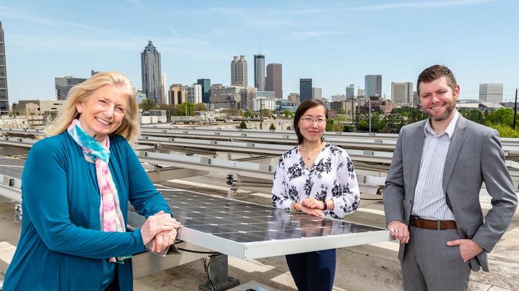 <p>Marilyn Brown, Regents Professor in the School of Public Policy, poses with Greenlink Group Chief Technology Officer Xiaojing Sun, and Matt Cox, the company's chief executive officer and founder. Sun and Cox worked with Brown while the ATHENIA energy modeling platform was under development at the Climate and Energy Policy Lab at the Georgia Institute of Technology.</p>