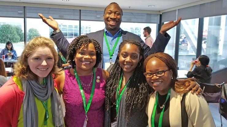 <p>Manu Platt, in the back, reunites with some of his former students at the Biomedical Engineering Society Annual Meeting: from left to right, Meghan Ferrall-Fairbanks, Monet Roberts, Simone Douglas-Green, and Adeola Michael, whom Platt called a “short but powerful crew.” Platt has won the 2021 Mentor Award from the American Association for the Advancement of Science, thanks to a nomination effort led by Roberts and Douglas-Green. (Photo Courtesy: Manu Platt)</p>