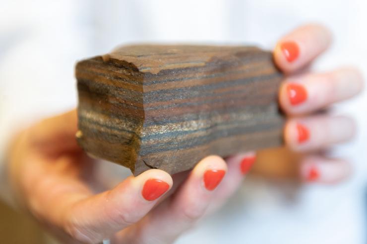 <p>Ancient tiger eye BIF (banded iron formation) rock with varying layers that include iron that fell out of ancient oceans. An eon ago, oceans appear to have been full of ferrous iron, which would have facilitated production of N2O (laughing gas). Credit: Georgia Tech / Allison Carter</p>