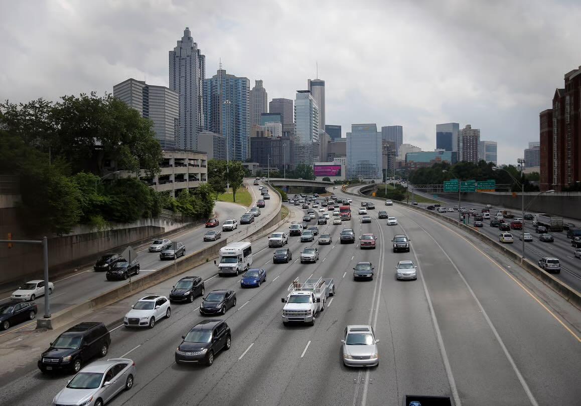 Traffic flows in and out of downtown Atlanta on the I-75/I-85 Connector Thursday, May 19, 2016, in Atlanta. (AP Photo/John Bazemore)