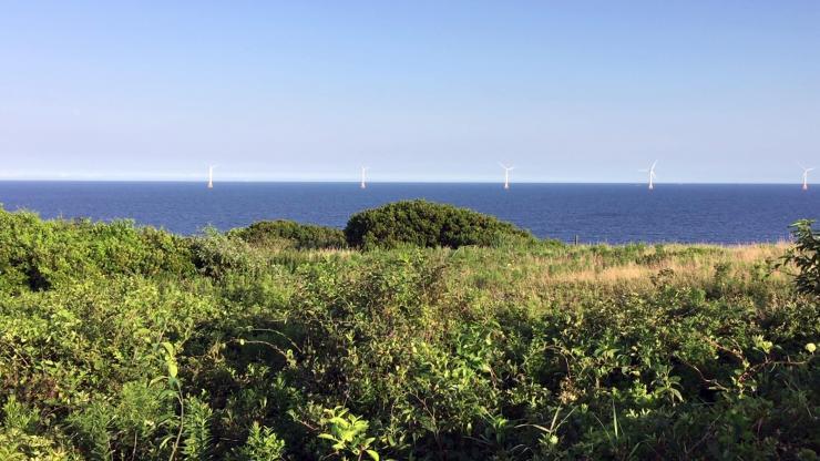 <p>Five wind turbines located off the coast of Block Island, RI. (Credit: John Toon, GTRI)</p>