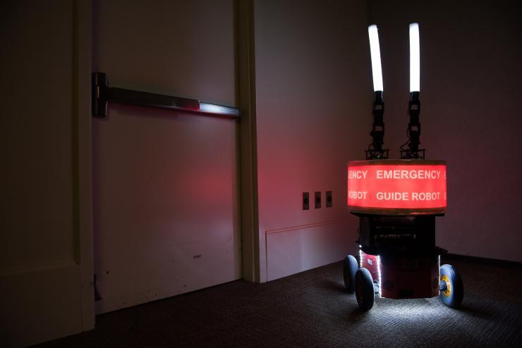 <p>Georgia Tech researchers built the “Rescue Robot” to determine whether or not building occupants would trust a robot designed to help them evacuate a high-rise in case of fire or other emergency. (Credit: Rob Felt, Georgia Tech)</p>