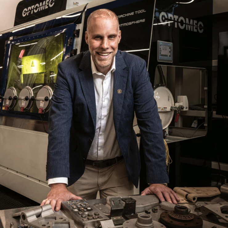 <p>Harnessing Automation: John Morehouse, director of the Georgia Center of Innovation for Manufacturing at the Georgia Department of Economic Development, with a laser cutter at Georgia Tech that produced a variety of parts Photo: Kevin Garrett</p>