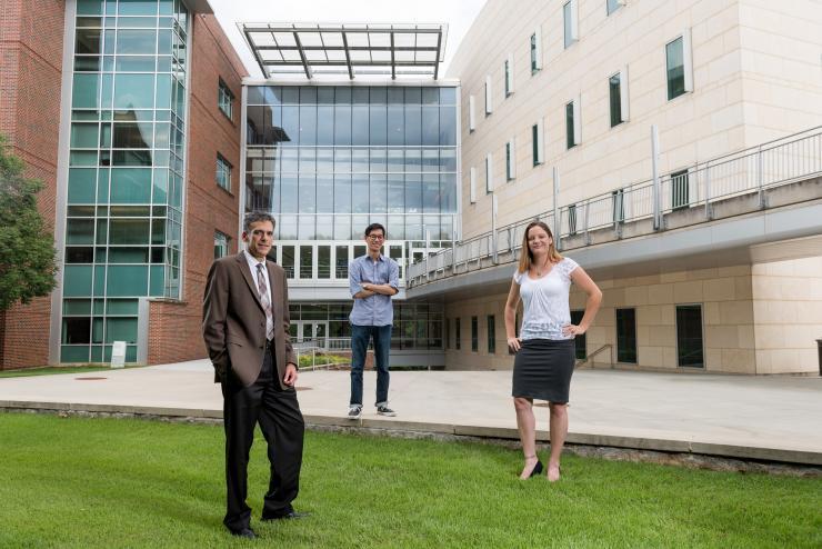 <p>Georgia Tech is part of the Center for Sustainable Nanotechnology, a $20 million NSF research center focusing on the molecular mechanisms by which nanoparticles interact with biological systems. Among the participants are (l-r) Rigoberto Hernandez, Gene Chong and Caley Allen, shown here in front of the Molecular Science and Engineering Building. (Credit: Rob Felt, Georgia Tech)</p>