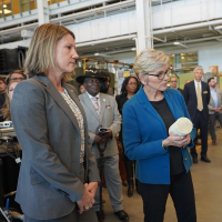 U.S. Secretary of Energy Jennifer Granholm is brought up to date by Georgia Tech's Krista Walton during a 2024 visit to campus.