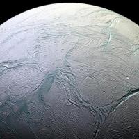 <p>Under the thick ice crust of Saturn's moon Enceladus flows water. Could it harbor life? A new NASA-funded research alliance called Oceans Across Space and Time wants to know. Credit: NASA</p>