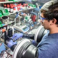 Researcher working on battery technology