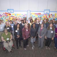 <p>Participants of the Negotiating the Digital and Data Divide Workshop, in front of the wall of challenges and visions on the future of data science education.</p>