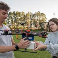 <p>Catherine Heaton (right) is a fourth-year aerospace engineering major who has participated in Experimental Flights since fall 2020. Heaton said she enjoys working with a diverse group of students to solve real-world issues (Credit: Christopher Moore, GTRI).</p>