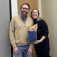 Michael Best, executive director of IPaT, presents Gillian Hayes with a gift bag before her IPaT distinguished alumnus talk on Oct. 17, 2024