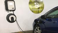 A dark blue electric car is plugged into a charger at an EV designated space in a parking structure. &lt;a href=&quot;https://commons.wikimedia.org/wiki/File:Chevy_Volt_2nd_gen_charging_Arlington_08_2017_5216.jpg&quot;&gt;Mariordo (Mario Roberto Durán Ortiz)&lt;/a&gt;, &lt;a href=&quot;https://creativecommons.org/licenses/by-sa/4.0&quot;&gt;CC BY-SA 4.0&lt;/a&gt;, via Wikimedia Commons