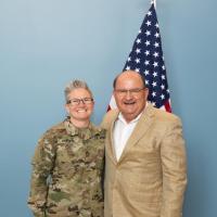 Trisha Purvis (left), a veterinary surgical technician at the Global Center for Medical Innovation, recently re-enlisted in the United States Army Reserve. Ken Zielmanski, director of quality assurance for GCMI’s T3 Labs and a retired Army lieutenant colonel, performed the re-enlistment ceremony. (Photo: Joya Chapman)