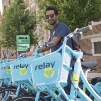 <p>Anirudh Gattani, a civil engineering graduate student, approaches the Relay bike hub on Techwood Drive at North Avenue. </p>