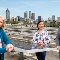 <p>Marilyn Brown, Regents Professor in the School of Public Policy, poses with Greenlink Group Chief Technology Officer Xiaojing Sun, and Matt Cox, the company's chief executive officer and founder. Sun and Cox worked with Brown while the ATHENIA energy modeling platform was under development at the Climate and Energy Policy Lab at the Georgia Institute of Technology.</p>