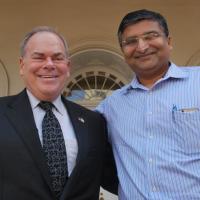 <p>Steve Cross, Georgia Tech's executive vice president for research, and Jaydev Desai, Petit Institute researcher and Coulter Department professor, meet at the inaugural International Symposium for Medical Robotics.</p>