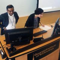 <p>Krish Roy and Johnna Temenoff, director and deputy director of CMaT, respectively, prepare the room for the next session.</p>