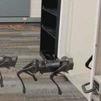 A four-legged robot at Georgia Tech opens door using sequential steps, but for the first time without having to relearn motions.