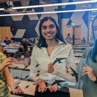 The Bird Safe Campus team shows their prototype window decals. L to R. - Amanda Janusz, Shivani Potdar, and Kaitlyn Tran.