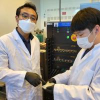 <p>Prof. Seung Woo Lee (left) and Michael J. Lee (right) have demonstrated a more cost-effective, safer solid polymer electrolyte (rubber material) for all-solid-state batteries. (Photo credit: Georgia Tech)</p>