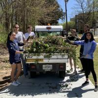 <p>Volunteers from Students Organizing for Sustainability remove ivy from an area near The Kendeda Building for Innovative Sustainable Design in April 2022.</p>