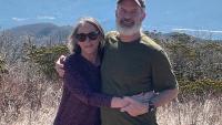Rebecca Watts Hull and her husband Jonathan pose at a scenic overlook on a hiking trip.