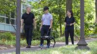 Georgia Tech researchers test their prototype of a robotic guide dog. Photo by Terence Rushin/College of Computing.