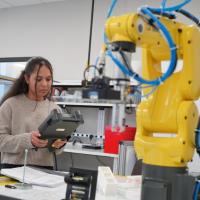 Naiya Salinas is one of a half-dozen students enrolled in the new AI Enhanced Robotic Manufacturing program at the Georgia Veterans Education Career Transition Resource (VECTR) Center, which is setting a new standard for technology-focused careers.