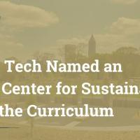 Image shows the Atlanta skyline with text in white reading "Georgia Tech Named an AASHE Center for Sustainability Across the Curriculum."