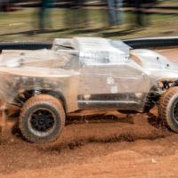 <p>At the Georgia Tech Autonomous Racing Facility, researchers are studying a one-fifth-scale autonomous vehicle as it traverses a dirt track. The work will help the engineers understand how to help driverless vehicles face the risky and unusual road conditions of the real world. (Credit: Rob Felt, Georgia Tech)</p>