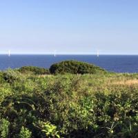 <p>Five wind turbines located off the coast of Block Island, RI. (Credit: John Toon, GTRI)</p>