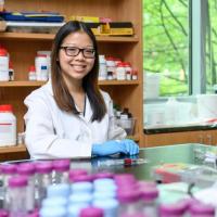<p>Researchers have developed a potentially new way to introduce macromolecules and therapeutic genes into human cells. Shown is National Science Foundation Graduate Research Fellow Anna Liu. (Credit: Rob Felt, Georgia Tech)</p>