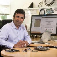 <p>The research of Assistant Professor Tushar Krishna focuses on building hardware platforms to run AI applications efficiently. (Photo: Allison Carter, Georgia Tech)</p>