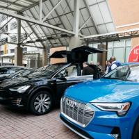 <p>Image of electric vehicles parked outside GT Hotel for Policy Forum</p>