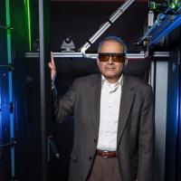 <p>Georgia Tech’s data center simulator uses lasers, wireless sensors, and other equipment to study air flow and cooling in server racks. Shown is Yogendra Joshi, a professor in Georgia Tech’s School of Mechanical Engineering. (Credit: Rob Felt, Georgia Tech)</p>