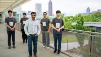 Associate Professor Tushar Krishna (center) and members of his research team — William Won (recently graduated, now at AMD), Changhai Man, Hanjiang Wu, and Jinsun Yoo — have announced Chakra, a new shared platform for understanding and improving complex AI systems.